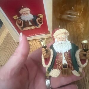 KEEPSAKE by Hallmark. Jolly old Jingle Santa Ornament with bell ringing details.